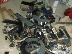 contoh huruf timbul stainless mirror